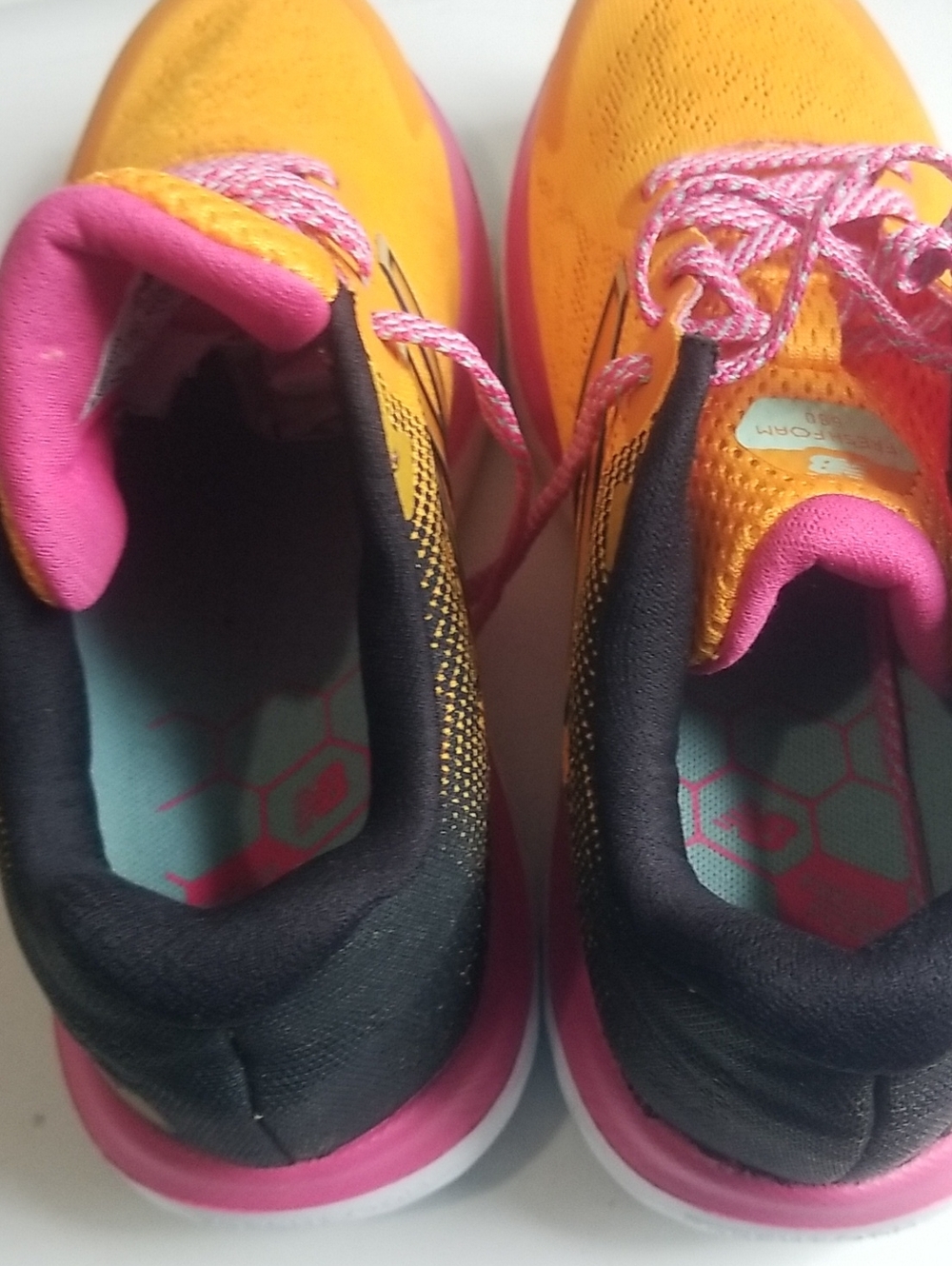 New Balance 680 Women' Yellow & Pink Athletic Sneakers